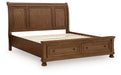 Zackaryn - King Sleigh Storage Bed - Warm Brown Signature Design by Ashley®