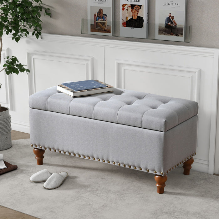 Upholstered Ottoman With Storage And Rivet Trim