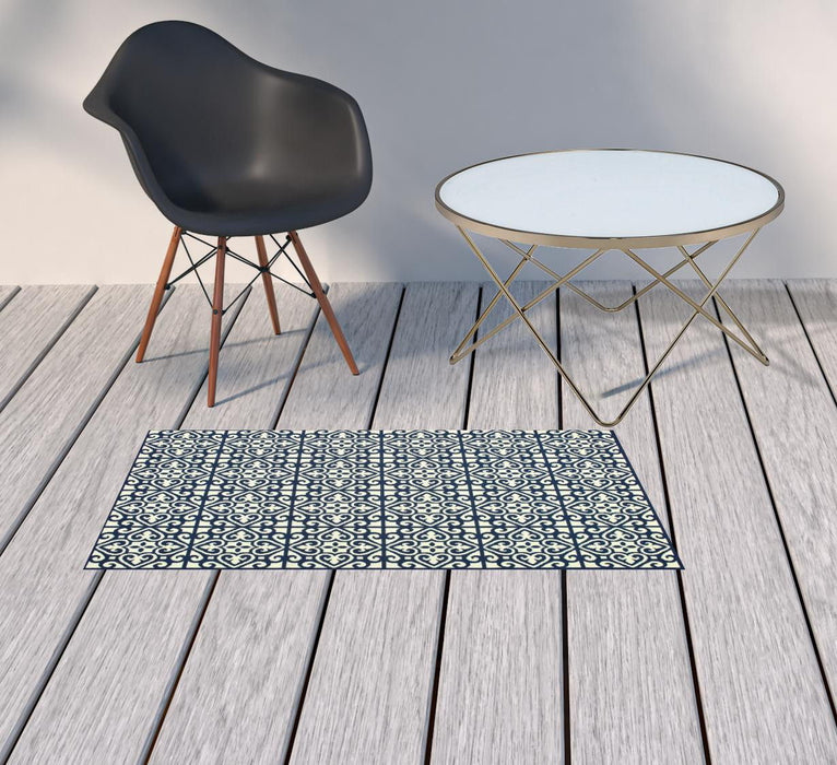 2' X 4' Geometric Stain Resistant Indoor / Outdoor Area Rug - Ivory / Blue