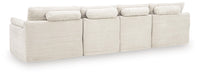 Fannin - 4-Piece Sectional With Ottoman - Ivory Signature Design by Ashley®