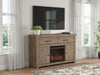 Garistyn - TV Stand With Fireplace Option Signature Design by Ashley®