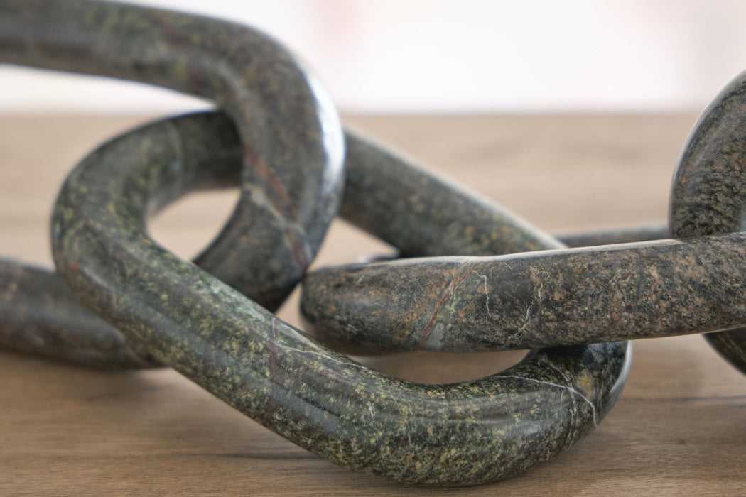 Laddbrook - Sculpture Signature Design by Ashley®