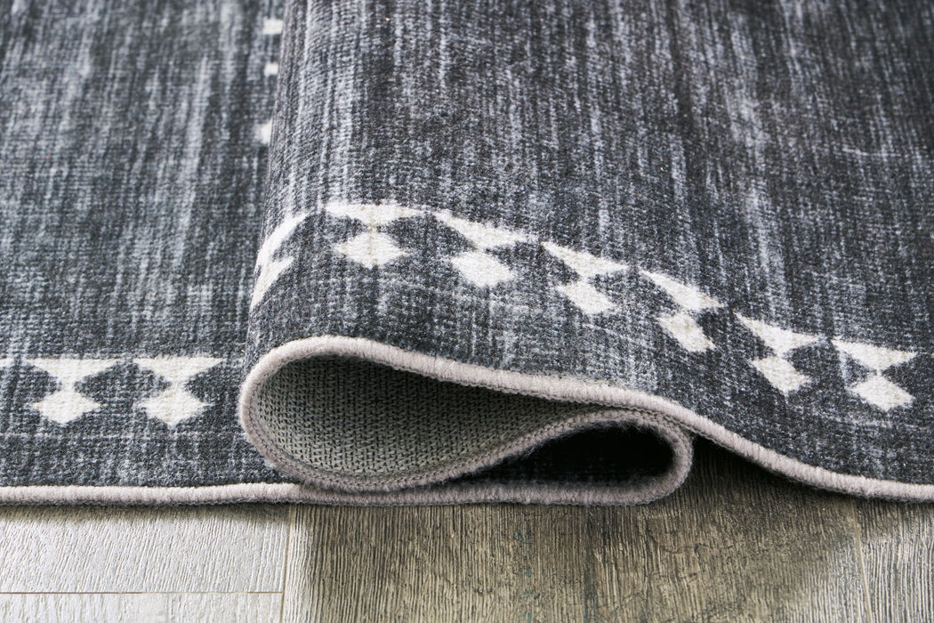 Arloman - 5' x 7' Rug - Black / Cream / Gray Signature Design by Ashley®
