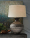 Magan - Metal Table Lamp  - Antique Bronze Finish Signature Design by Ashley®