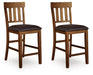 Ralene - Upholstered Barstool (Set of 2) - Medium Brown Signature Design by Ashley®