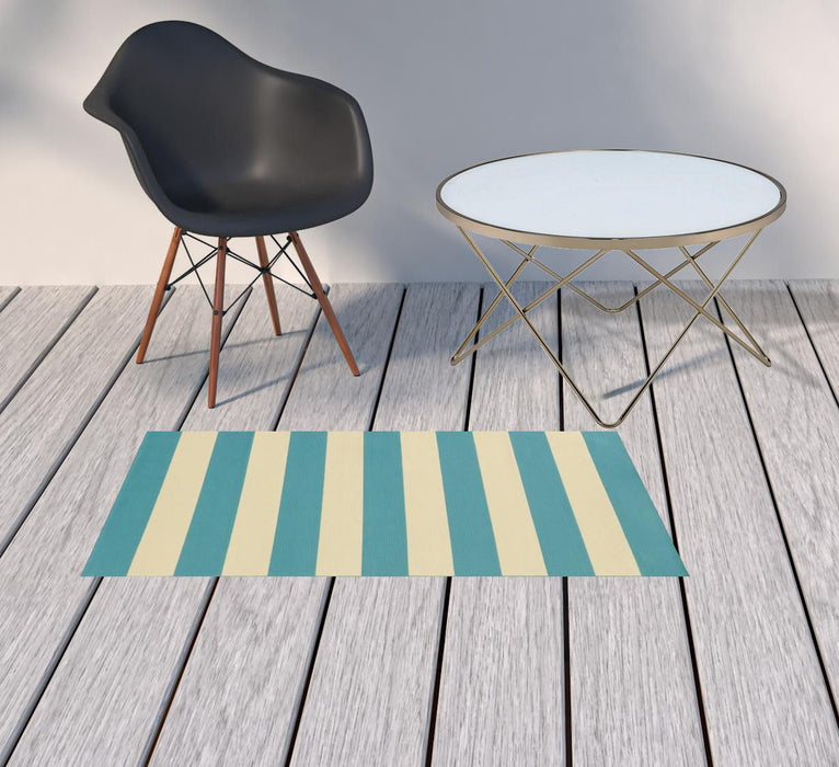 2' X 4' Geometric Stain Resistant Area Rug Indoor & Outdoor - Ivory / Blue