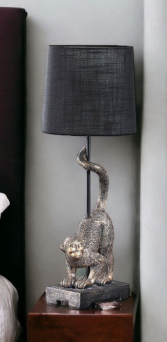 Monkey Table Lamp With Black Drum Shade - Antiqued Gold