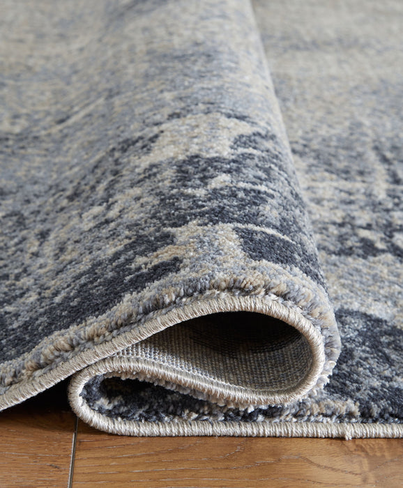 Langrich - 5' x 7' Rug - Blue / Gray / Cream Signature Design by Ashley®