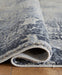 Langrich - 5' x 7' Rug - Blue / Gray / Cream Signature Design by Ashley®