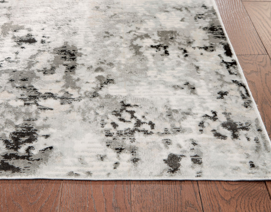 Greyland - 5' x 7' Rug - Multi Signature Design by Ashley®