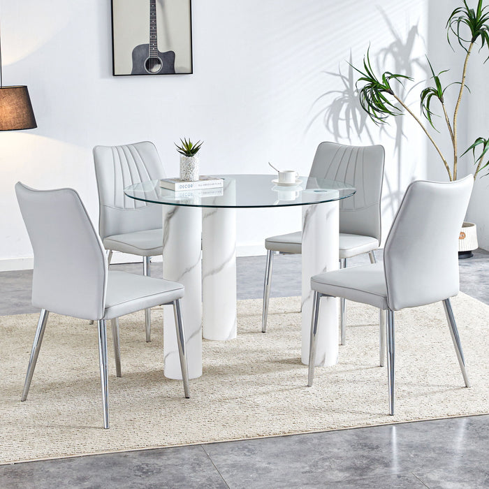 A Modern Minimalist Circular Dining Table Suitable For 6 - 8 People, (Set of 4) Piece PU Leather Backrest And Silver Metal Legs Modern Dining Chairs - MDF / Glass