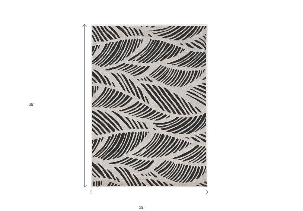 3' X 5' Machine Woven UV Treated Tropical Palm Leaves Indoor / Outdoor Area Rug - Black White