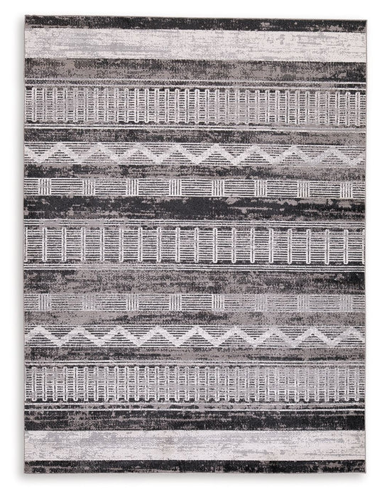 Henchester - 5' x 7' Rug - Multi Signature Design by Ashley®
