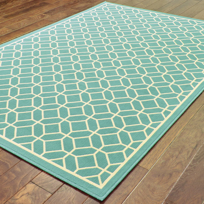 4' X 6' Geometric Stain Resistant Indoor & Outdoor Area Rug - Ivory / Blue