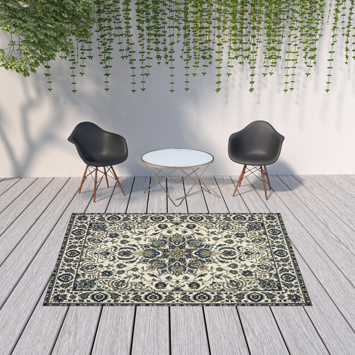 7' X 10' Oriental Stain Resistant Indoor / Outdoor Area Rug - Ivory / Blue