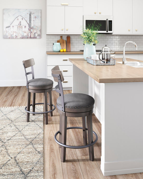 Caitbrook - UPH Swivel Barstool  - Gray Signature Design by Ashley®