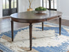 Lavinton - 8 Pc. - Dining Room Extension Table, 6 Side Chairs, Server - Brown Signature Design by Ashley®