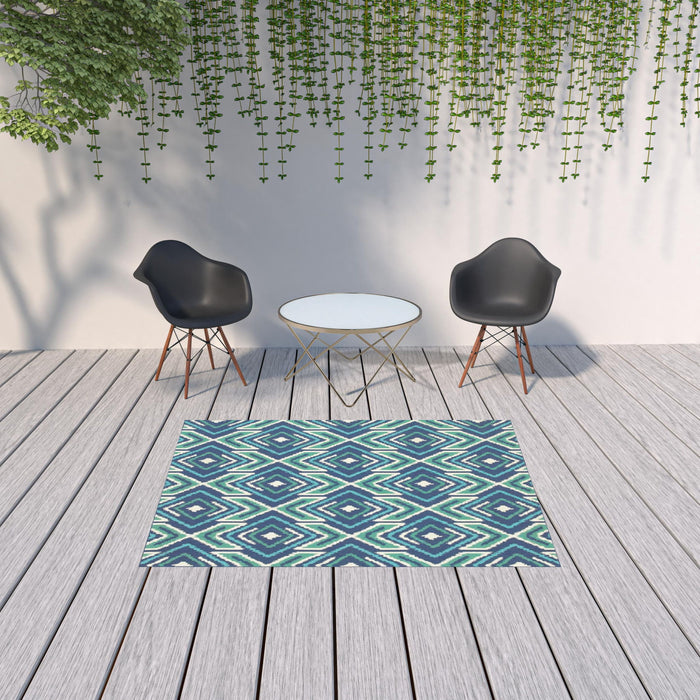 5' X 8' Geometric Stain Resistant Area Rug Indoor / Outdoor - Ivory / Blue