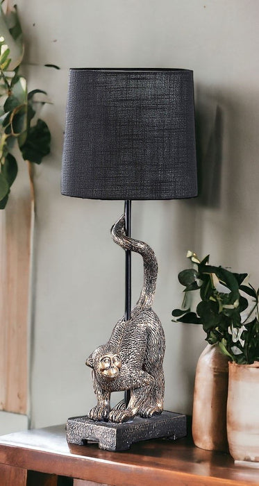 Monkey Table Lamp With Black Drum Shade - Antiqued Gold