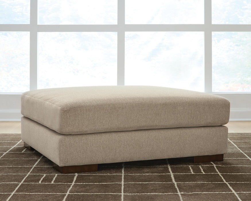 Linenhause - Oversized Accent Ottoman - Dune Benchcraft®