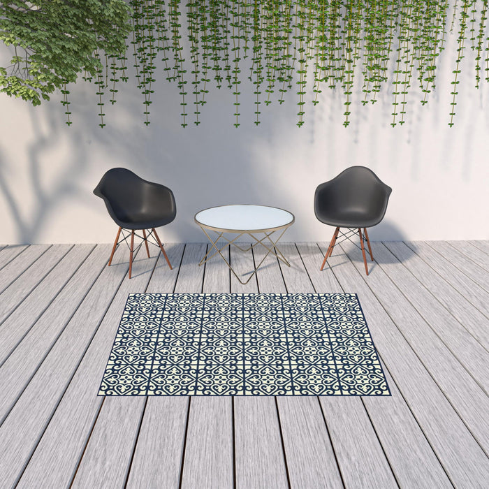 5' X 8' Geometric Stain Resistant Indoor / Outdoor Area Rug - Ivory / Blue