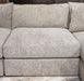Nexora-Court - Armless Chair - Burlap Signature Design by Ashley®
