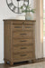 Karallin - Seven Drawer Chest - Medium Brown Signature Design by Ashley®