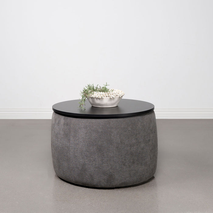 Reeves - Round Upholstered Lift Top Storage Ottoman - Gray Furniture Max