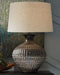 Magan - Metal Table Lamp  - Antique Bronze Finish Signature Design by Ashley®