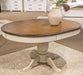 Wirloni - Oval Dining Room Butterfly Extension Table - Antique White / Brown Signature Design by Ashley®