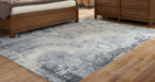 Langrich - 5' x 7' Rug - Blue / Gray / Cream Signature Design by Ashley®