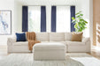 Fannin - 4-Piece Sectional With Ottoman - Ivory Signature Design by Ashley®