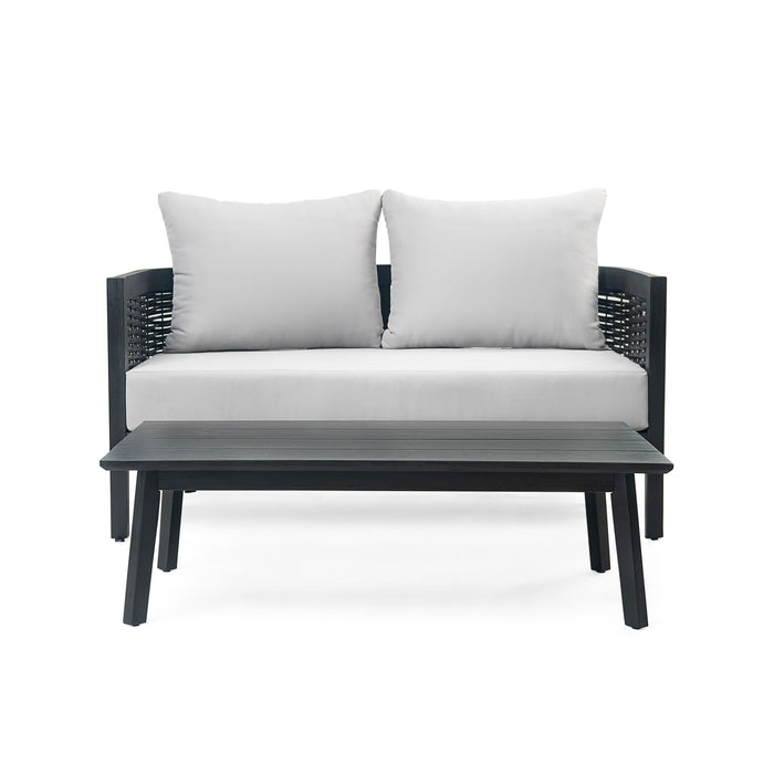 Outdoor Seating Group With Cushions And Coffee Table