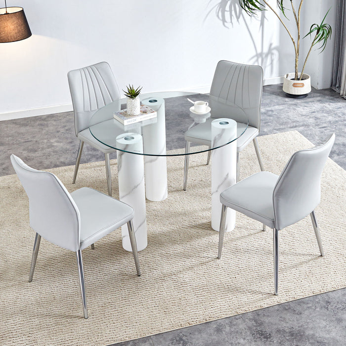 A Modern Minimalist Circular Dining Table Suitable For 6 - 8 People, (Set of 4) Piece PU Leather Backrest And Silver Metal Legs Modern Dining Chairs - MDF / Glass