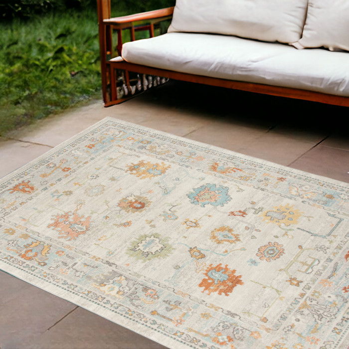 9' X 12' Floral Stain Resistant Indoor / Outdoor Area Rug - Blue / Orange