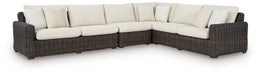 Kimora - 7 Pc. - 4-Piece Outdoor Sectional, Swivel Glider Lounge, Cocktail Table, End Table - Beige / Dark Brown Signature Design by Ashley®