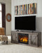 Wynnlow - TV Stand With Faux Firebrick Fireplace Insert - Gray Signature Design by Ashley®