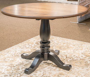 Clorazi - Round Dining Room Drop Leaf Table - Black / Brown Signature Design by Ashley®