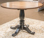 Clorazi - Round Dining Room Drop Leaf Table - Black / Brown Signature Design by Ashley®