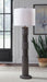 Fainwell - Poly Floor Lamp - Distressed Black Signature Design by Ashley®